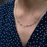 Двойно колие с плетка и кубчета, изработено от медицинска стомана с 16К златно покритие.