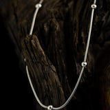 Сребристо дамско колие с топчета